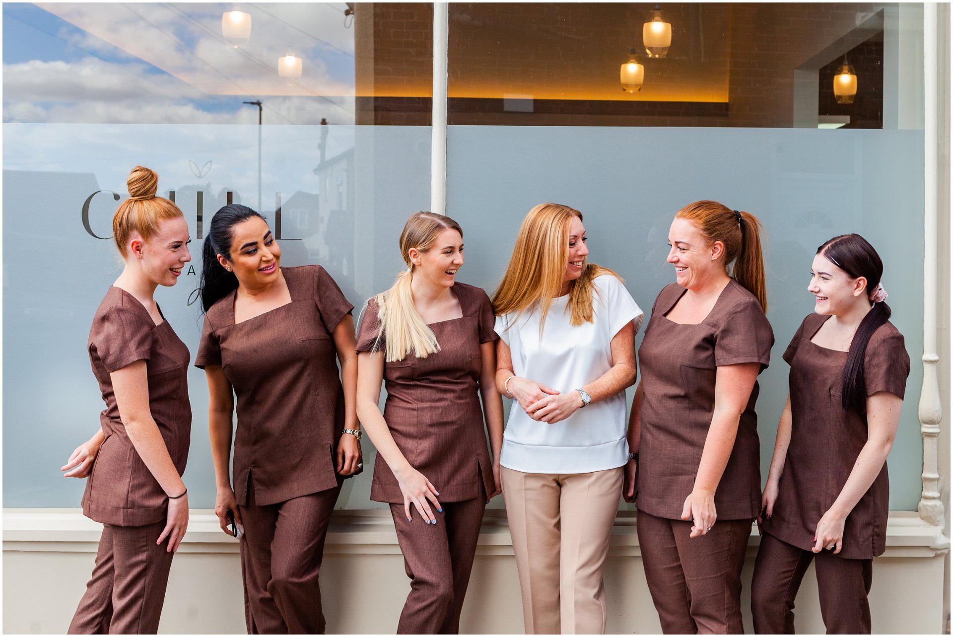 Team of beauty therapists stood outside the Chill Beauty salon in Wakefield. Images by London brand photographer AKP Branding Stories