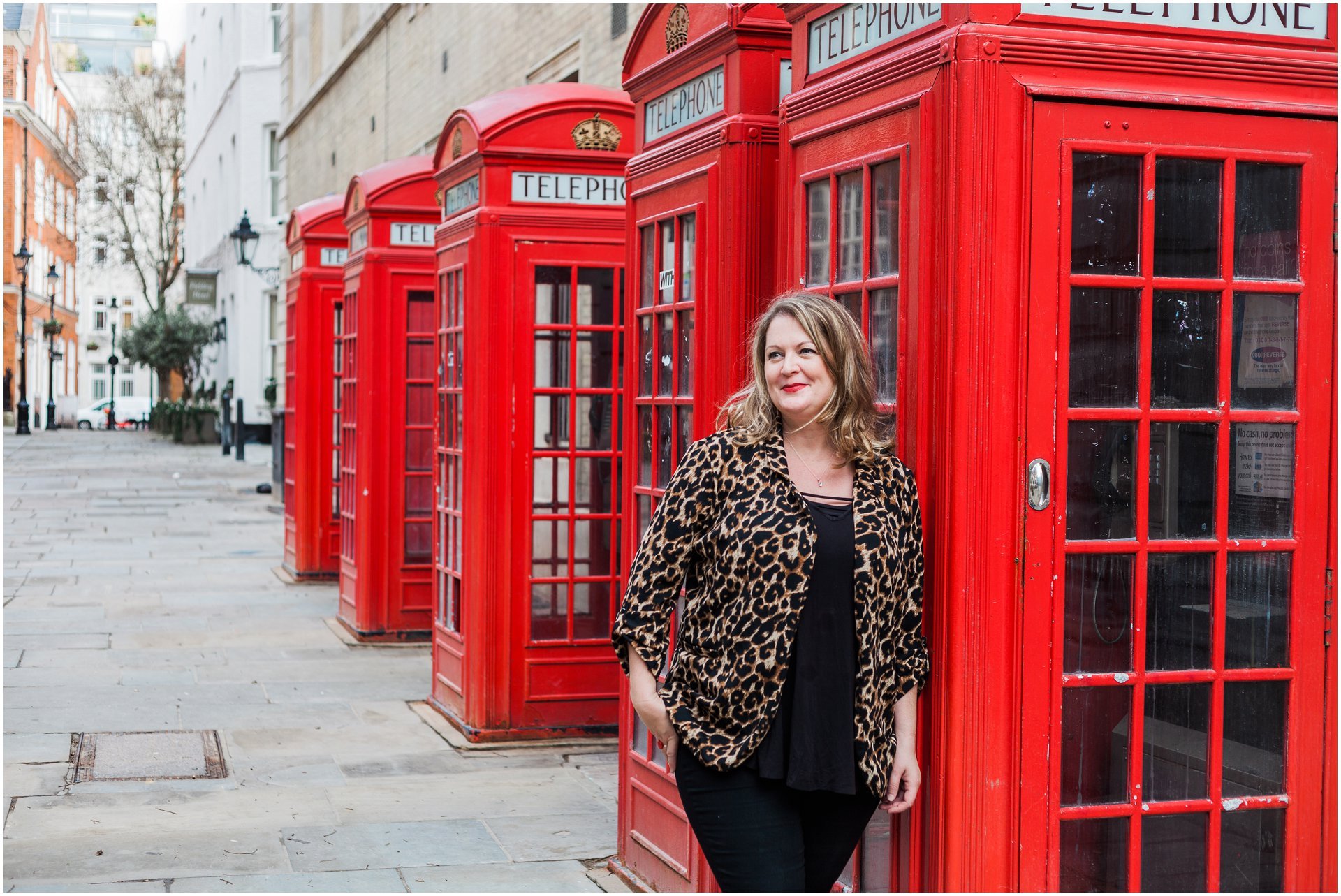 Claire Louise Branding on her London brand shoot near the Covent Garden red phone boxes. Images by London brand photographer AKP Branding Stories